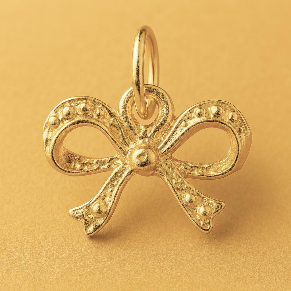 18ct Yellow Gold - Sculpted Ribbon Bow Charm