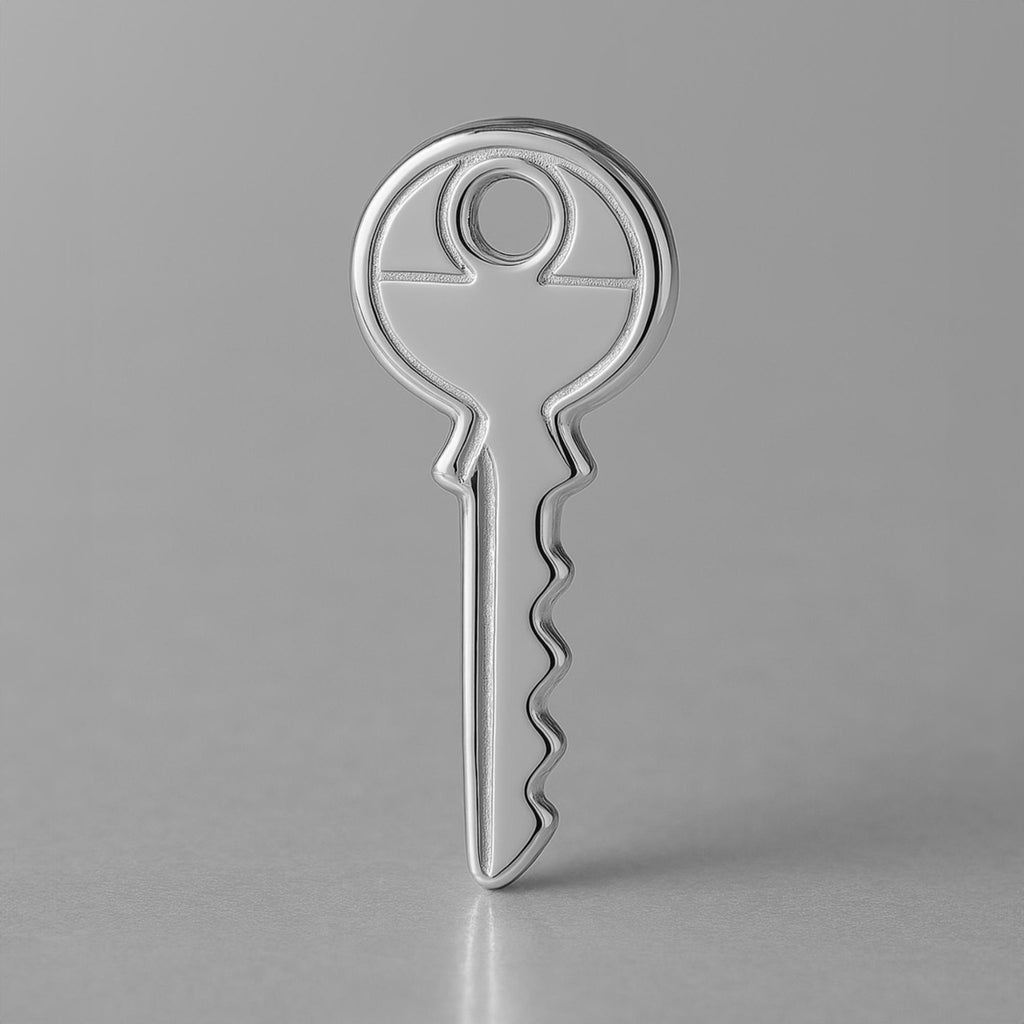950 Platinum - Vintage House Key Charm