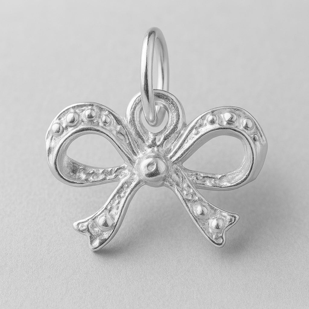 9ct White Gold - Sculpted Ribbon Bow Charm
